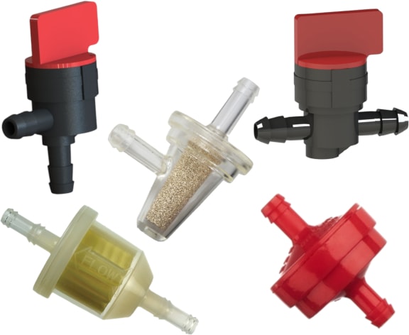 Selected ANSI/OPEI B71.10-2018 compliant ITW plastic fuel filters and fuel shut-off valves. Center: 8423-01-9909 elbow filter. Clockwise from top left: 7413-02-9909 valve, 7423-02-9909 valve, 8408-00-9909 filter and 8479-00-9909 filter.